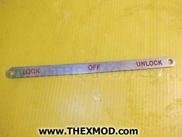 Plate - Lock - Off - Unlock - 174.5mm Lg- FV738611-1